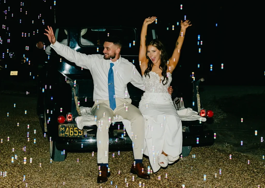 Bride and groom making a fun TikTok-style grand exit at a trendy Texas wedding venue