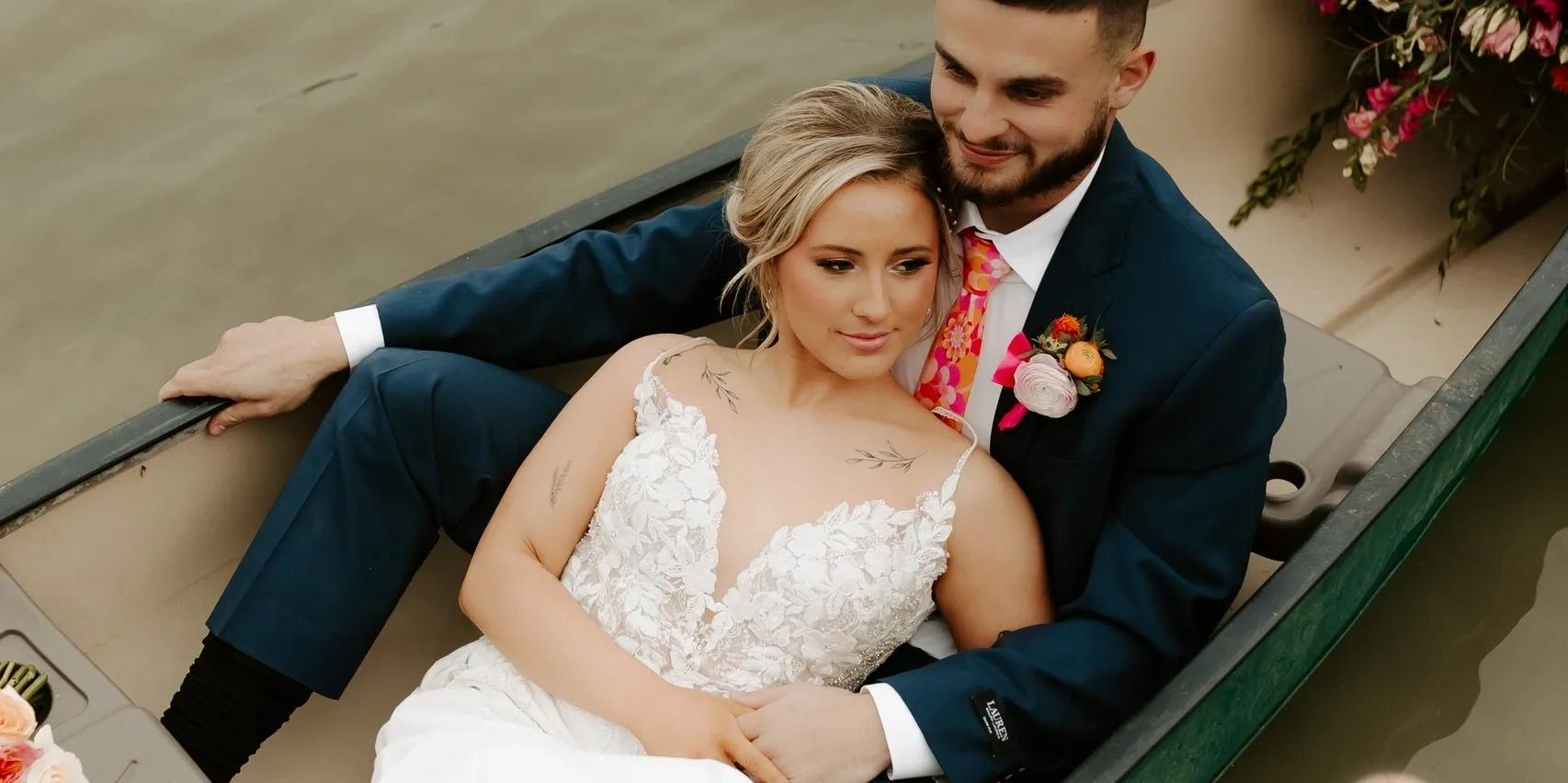 Romantic couple canoeing on Richland Chambers Lake at Lakefront Acres in Kerens, TX, an all-inclusive wedding venue