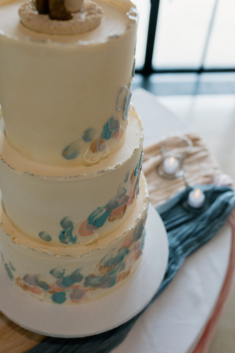 Corsicana wedding venue cake with pink and blue icing.