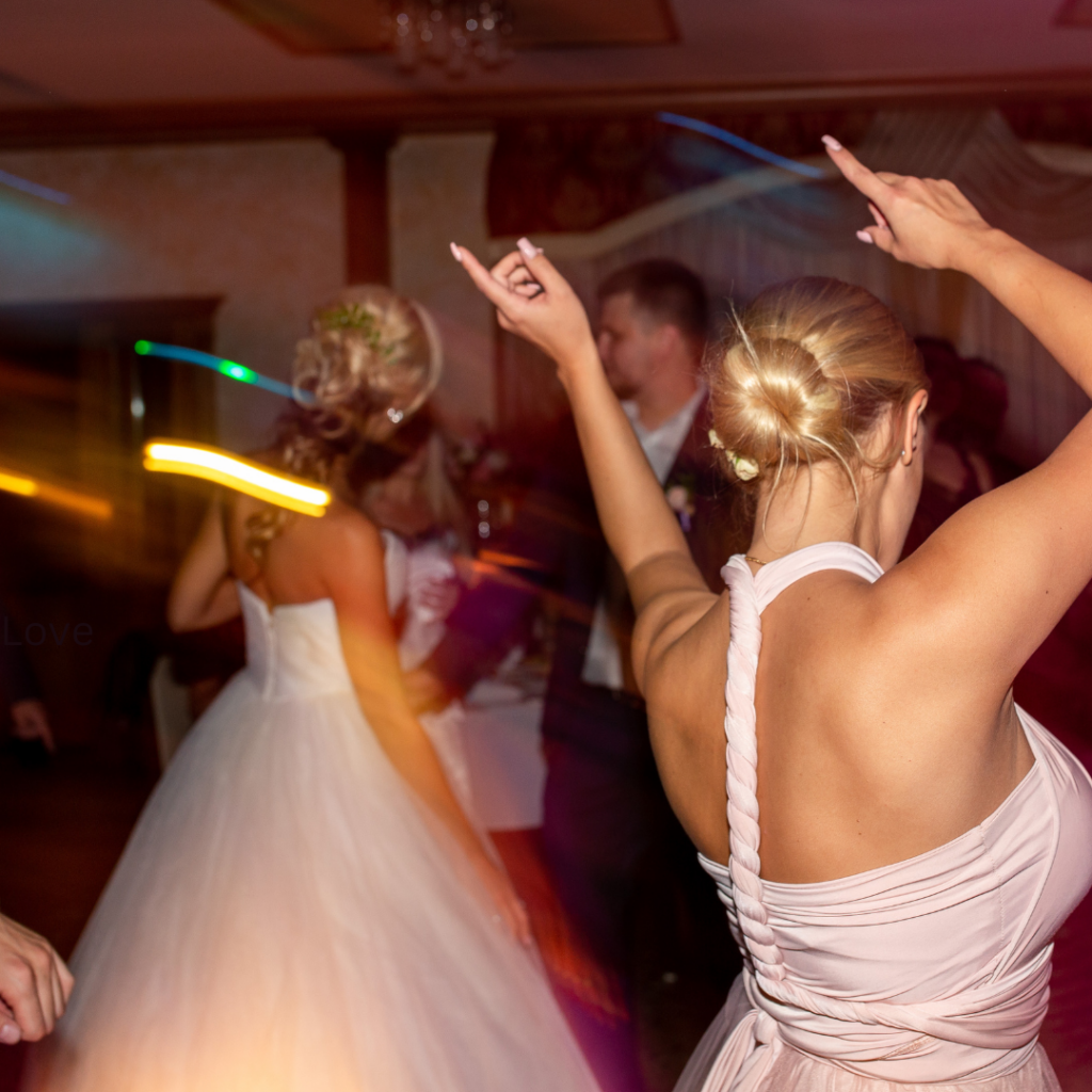 Bride and groom celebrating their reception with a high-energy viral wedding dance trend at a Texas wedding venue
