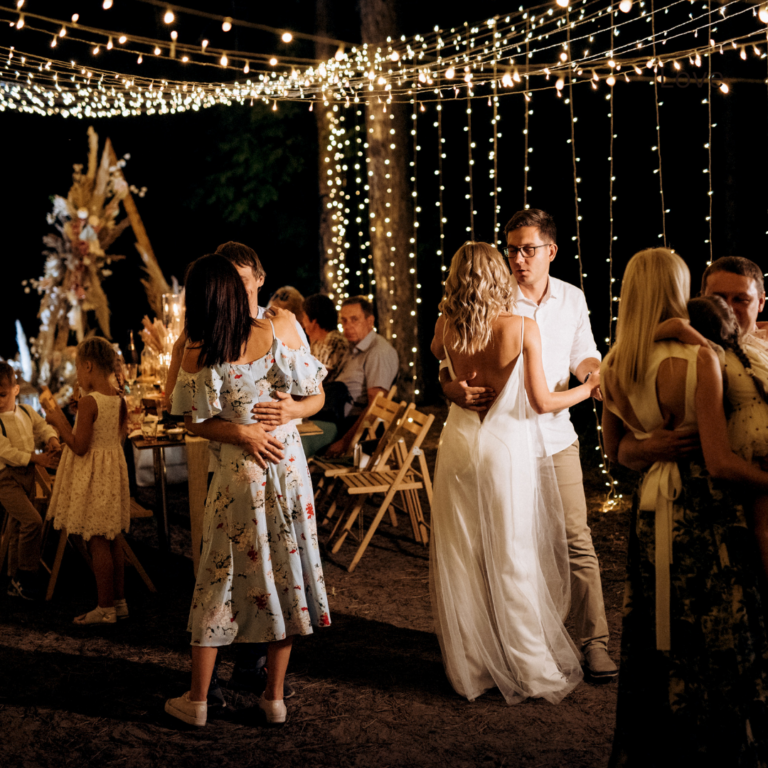 Anniversary dance tradition under the twinkle lights.