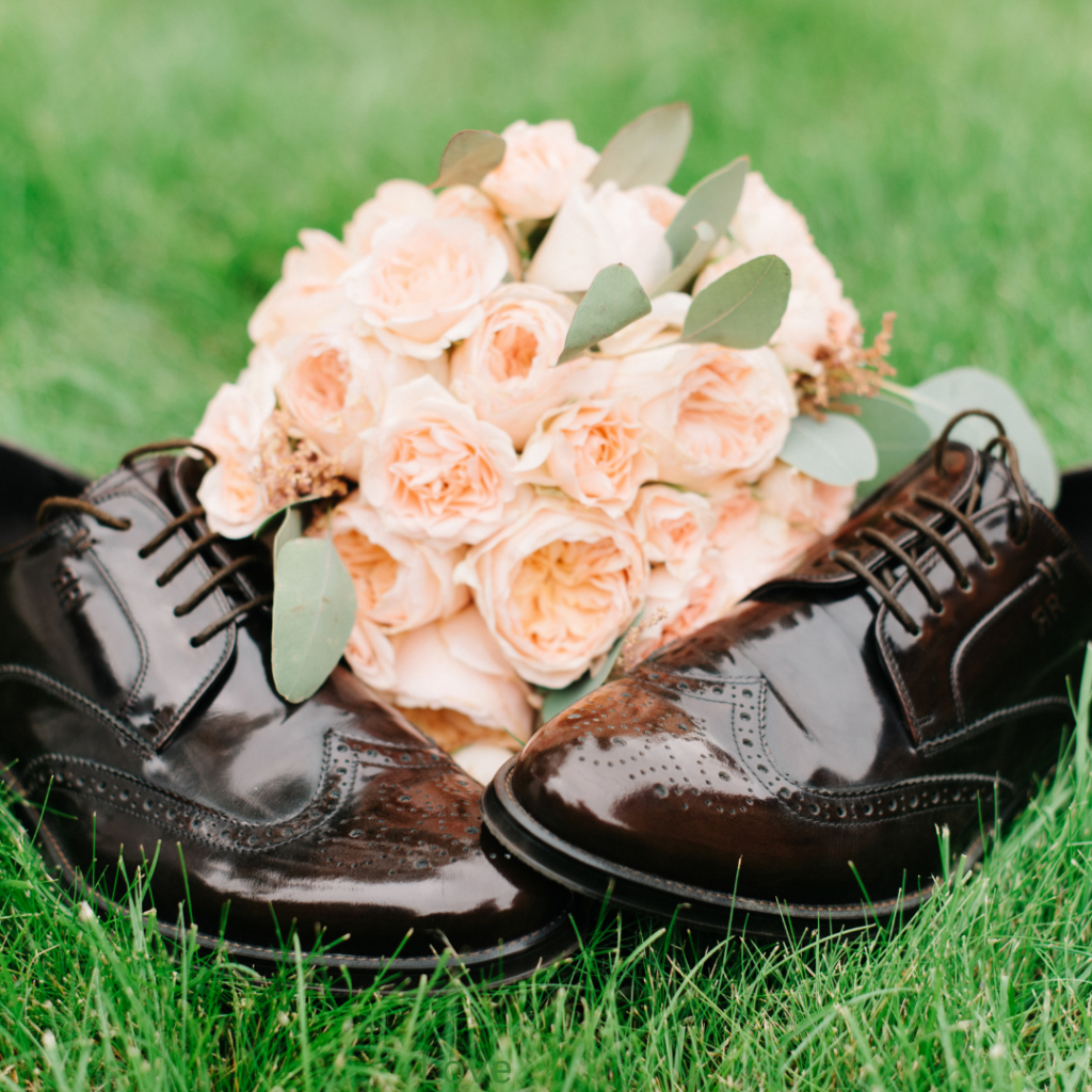 Black tuxedo shoes with a peach bridal bouquet in Dallas Texas.