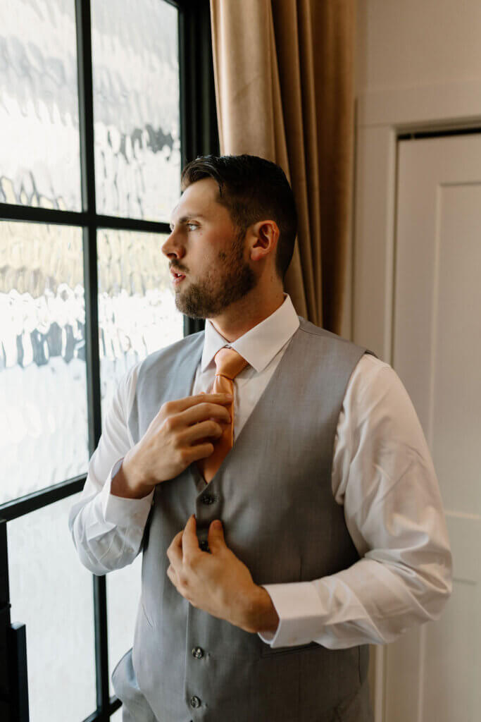 groom picture ideas, pictures of groom at our wedding venues in East Texas, modern wedding pictures, black and white wedding.