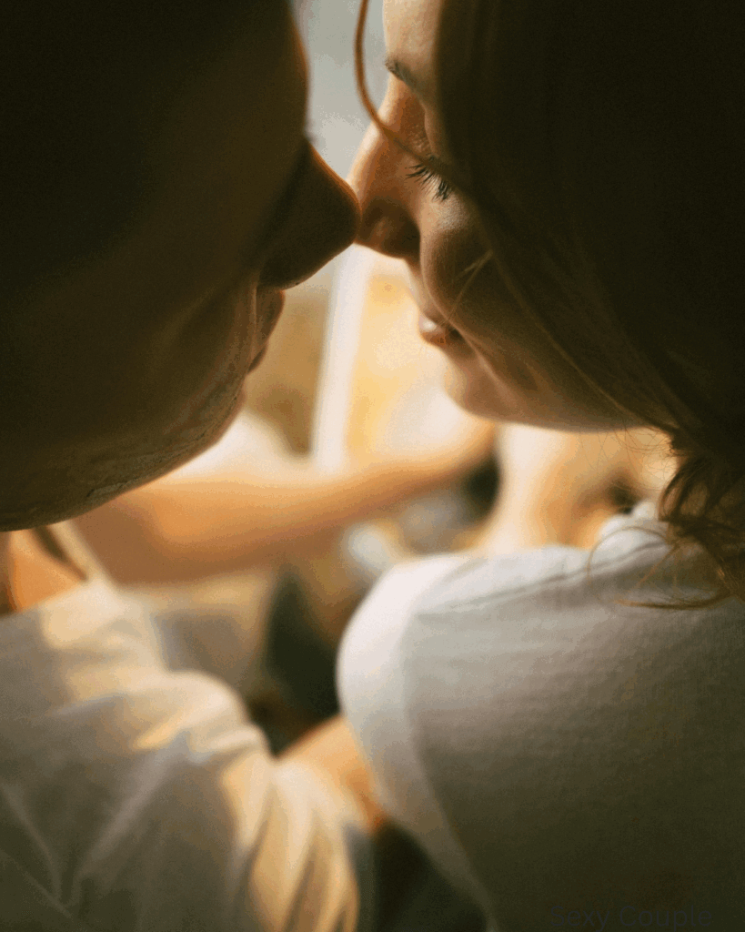 Young couple enjoying a cozy night in while reading truth or dare questions.
