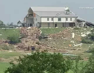 Storm clouds over Texas wedding venue representing unpredictable weather risks