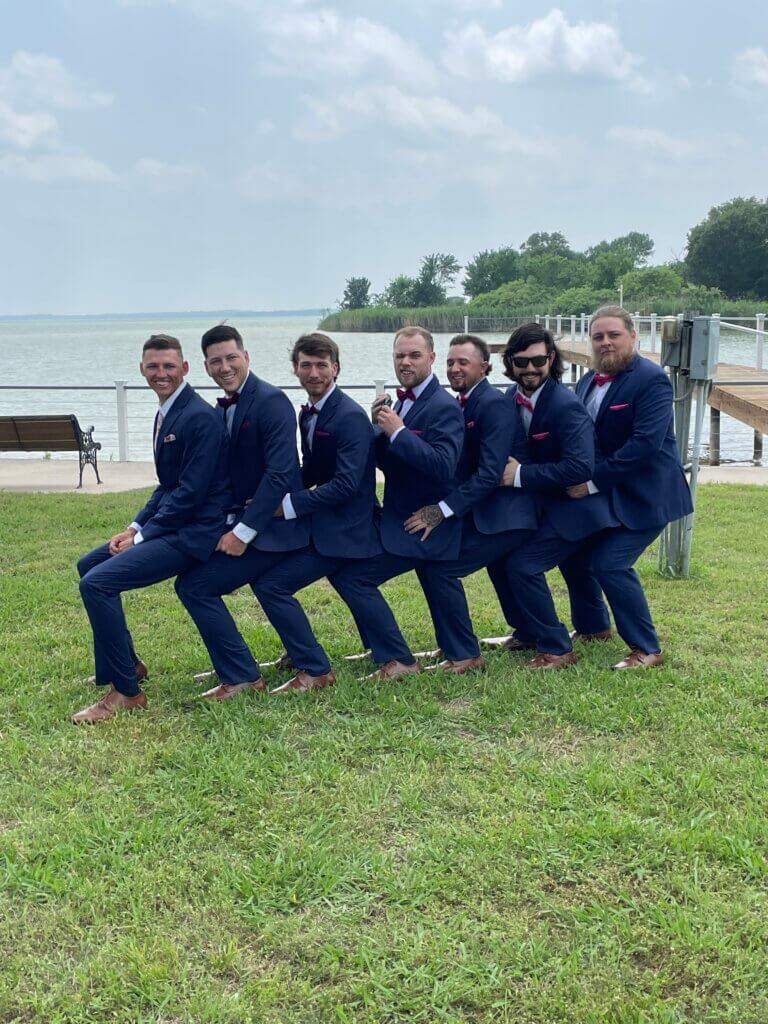 Groom laughing during Best Man speech