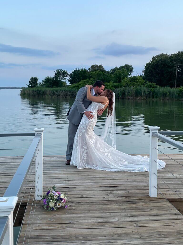 Waterfront wedding venue in North Texas featuring outdoor ceremony space, lake views, and sunset photo opportunities at Lakefront Acres