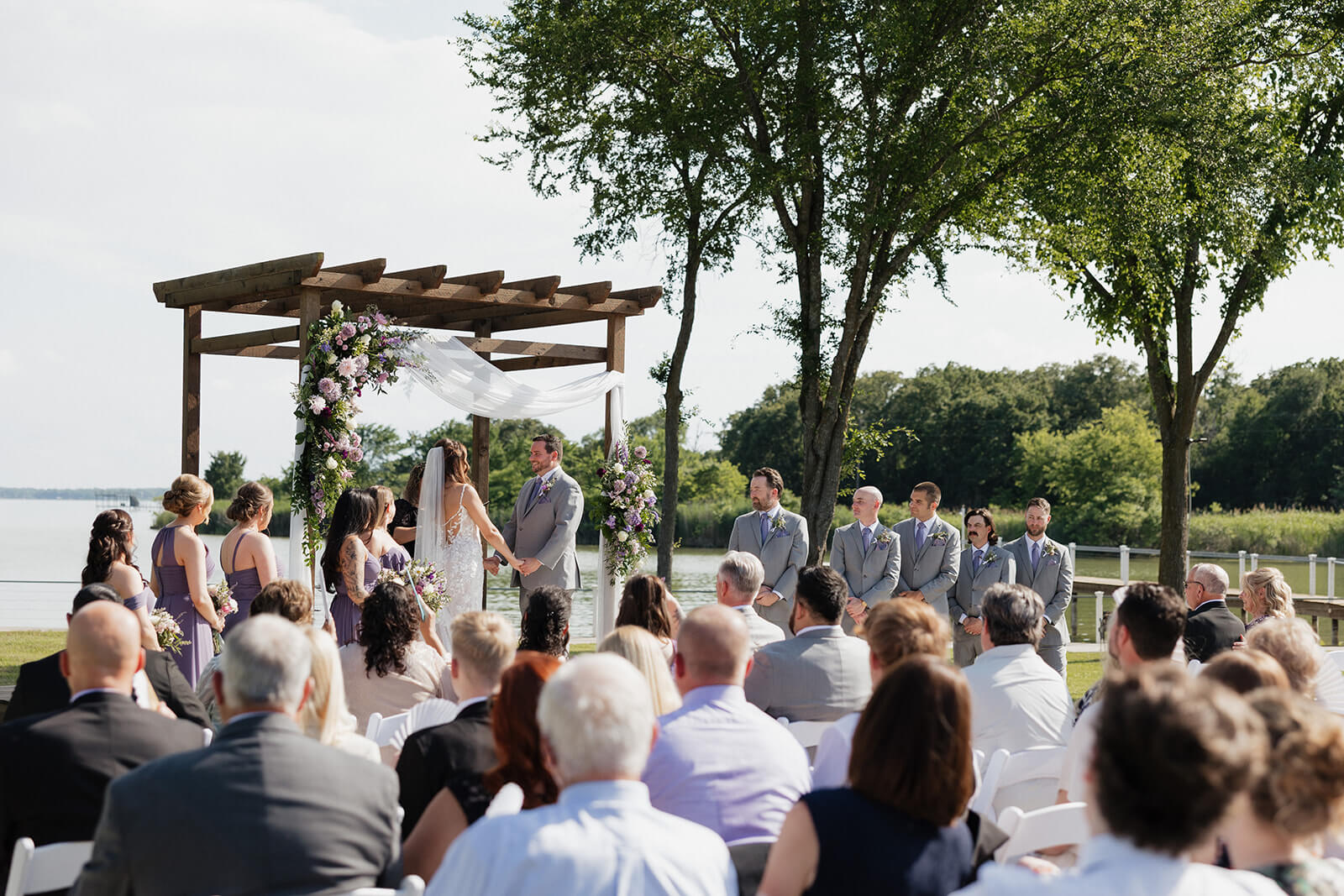 Lakeside wedding ceremony at Lakefront Acres in Kerens Texas