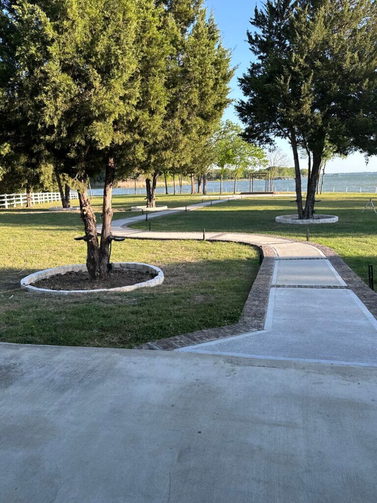 Outdoor lakeside wedding ceremony overlooking Richland-Chambers Lake in North Texas.